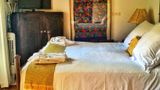 <b>Casa Encantada Room</b>. Images powered by <a href=https://www.travelagewest.com/Hotels/Antigua-Guatemala-Guatemala/