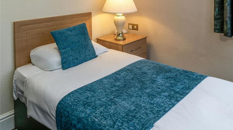 The Royal Court Hotel Room