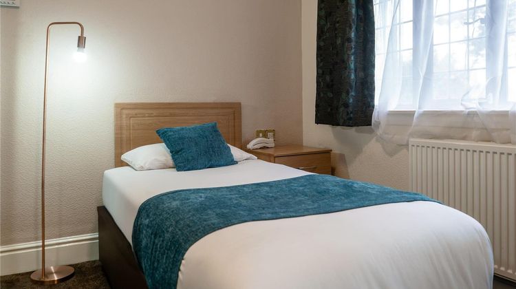 The Royal Court Hotel Room