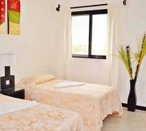 Vela's Condos Room