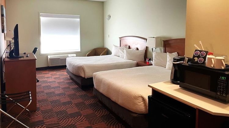 Service Plus Inns & Suites Room