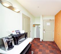 Service Plus Inns & Suites Room