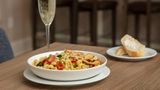 <b>Hilton Garden Inn Johns Creek Restaurant</b>. Images powered by <a href="https://iceportal.shijigroup.com/" title="IcePortal" target="_blank">IcePortal</a>.