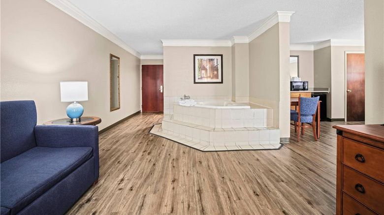 <b>Baymont Inn & Suites Madisonville Suite</b>. Images powered by <a href="https://iceportal.shijigroup.com/" title="IcePortal" target="_blank">IcePortal</a>.