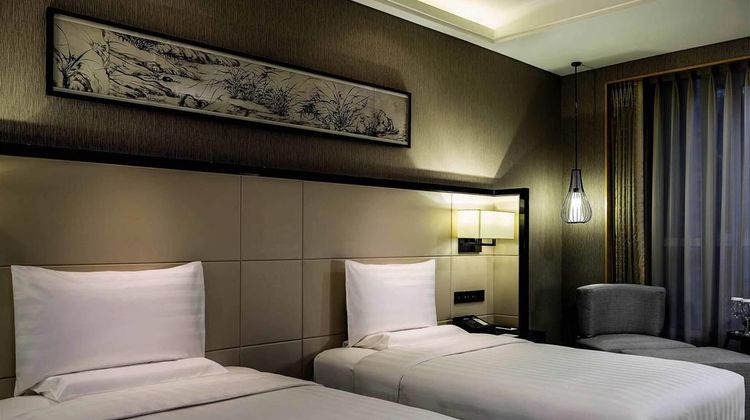 Pullman Qingdao Ziyue Hotel Room