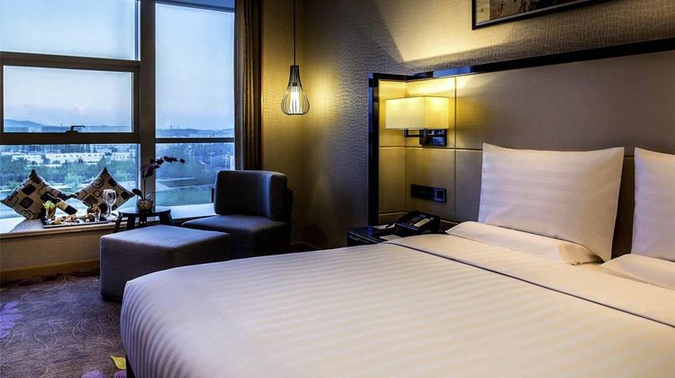 Pullman Qingdao Ziyue Hotel Room