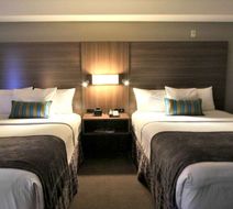 Executive Inn & Suites Room