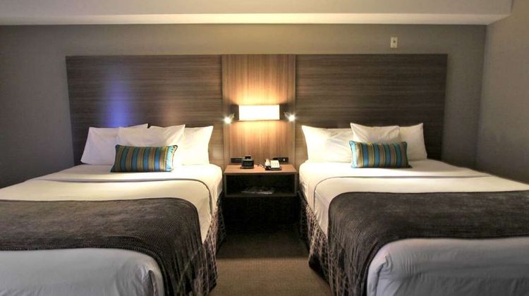 Executive Inn & Suites Room