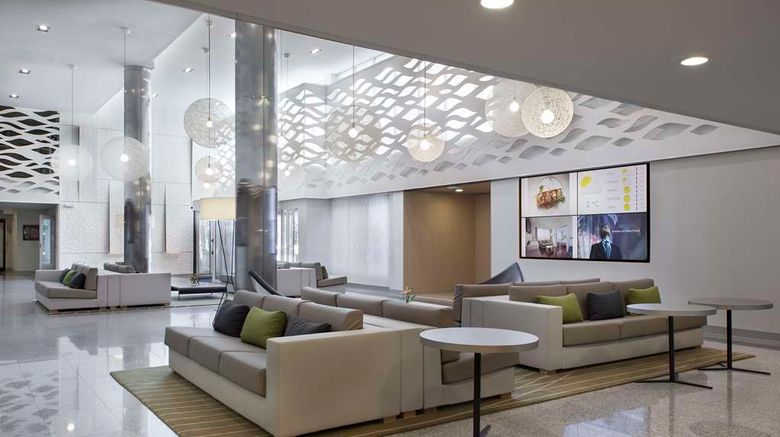 <b>NH Hotel Iruna Park Lobby</b>. Images powered by <a href="https://iceportal.shijigroup.com/" title="IcePortal" target="_blank">IcePortal</a>.
