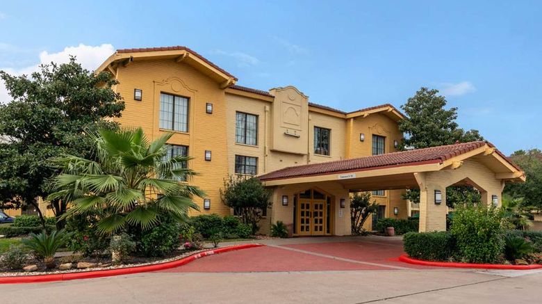 Super 8 by Wyndham The Woodlands North Exterior. Images powered by <a href="https://iceportal.shijigroup.com" target="_blank" rel="noopener">Ice Portal</a>.