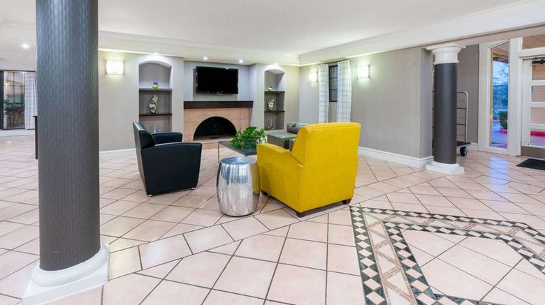 <b>Super 8 by Wyndham The Woodlands North Lobby</b>. Images powered by <a href="https://iceportal.shijigroup.com/" title="IcePortal" target="_blank">IcePortal</a>.