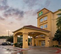 La Quinta Inn & Suites Bush Intl Airport Exterior