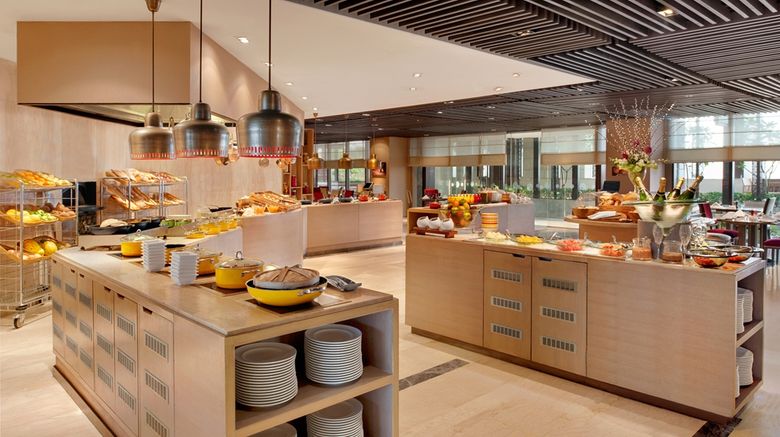 <b>The Leela Ambience Convention Hotel Restaurant</b>. Images powered by <a href="https://iceportal.shijigroup.com/" title="IcePortal" target="_blank">IcePortal</a>.