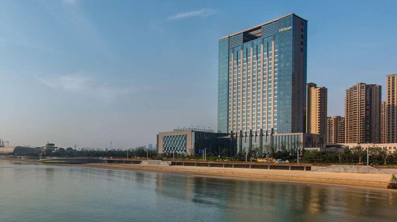 <b>Hilton Yantai Golden Coast Exterior</b>. Images powered by <a href="https://iceportal.shijigroup.com/" title="IcePortal" target="_blank">IcePortal</a>.