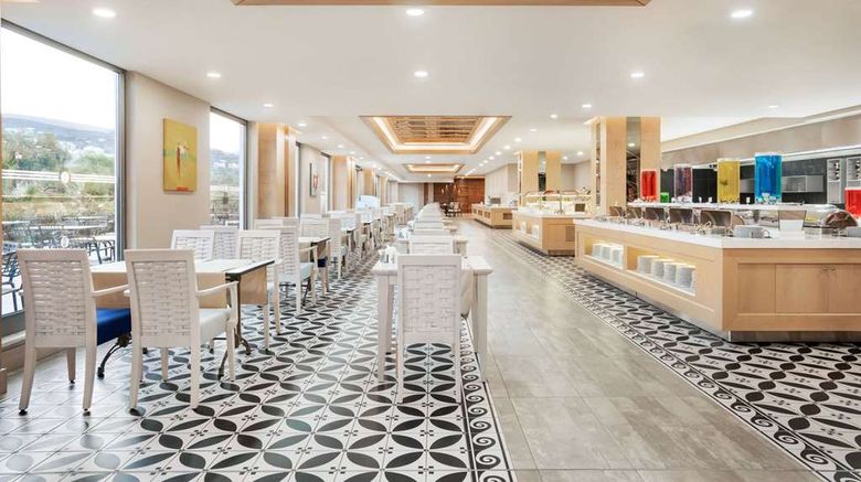 <b>Ramada Hotel & Suites Kusadasi Restaurant</b>. Images powered by <a href="https://iceportal.shijigroup.com/" title="IcePortal" target="_blank">IcePortal</a>.