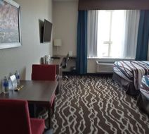 Encore Suites by Service Plus Inns Room