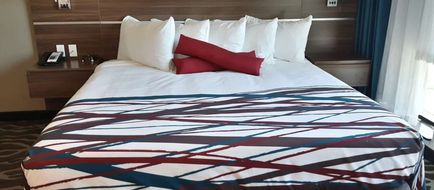 Encore Suites by Service Plus Inns Room