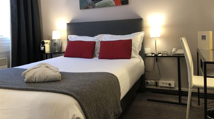 Le Dauphin Hotel Room