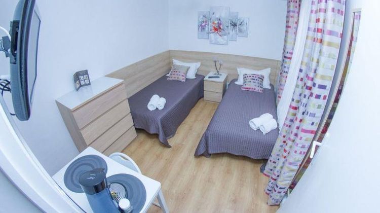 Hotel De l'Horloge Room