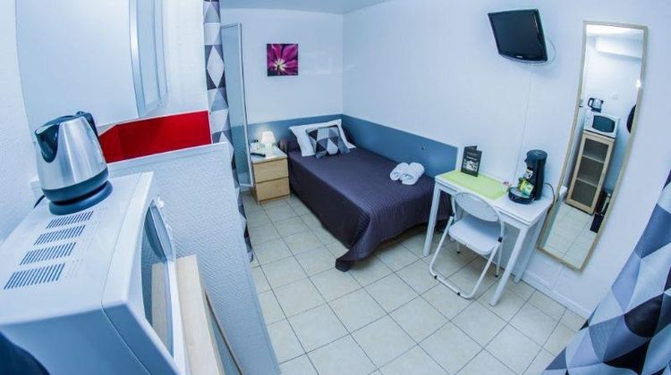 Hotel De l'Horloge Room