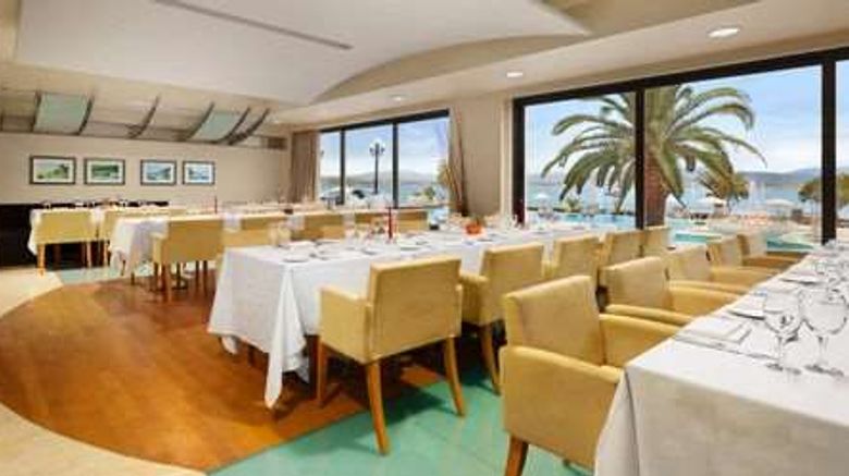 <b>Wyndham Loutraki Poseidon Resort Restaurant</b>. Images powered by <a href="https://iceportal.shijigroup.com/" title="IcePortal" target="_blank">IcePortal</a>.