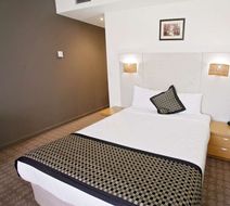 Golden Pebble Hotel Room