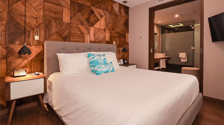 The Fives Downtown Hotel Curio by Hilton Room