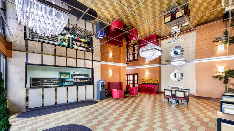 <b>Rodeway Inn Capri Lobby</b>. Images powered by <a href="https://iceportal.shijigroup.com/" title="IcePortal" target="_blank">IcePortal</a>.