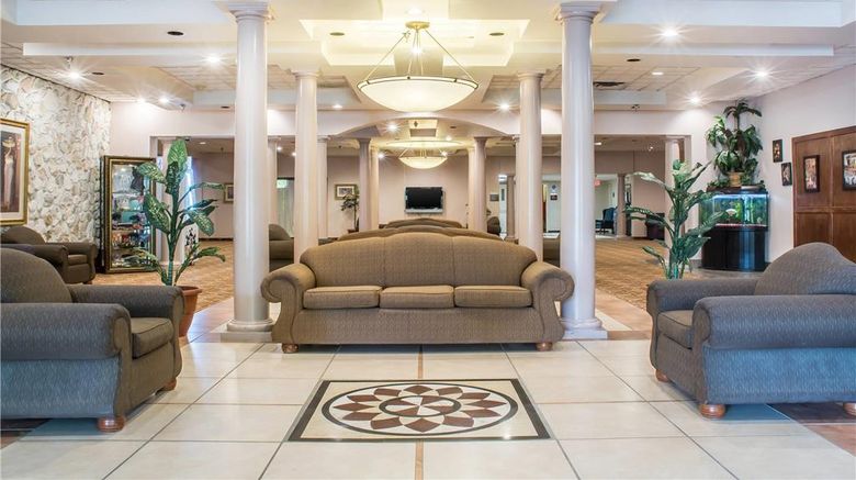 <b>Quality Inn & Suites Palm Island Lobby</b>. Images powered by <a href="https://iceportal.shijigroup.com/" title="IcePortal" target="_blank">IcePortal</a>.