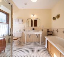The Whispering Pine Lodge Room