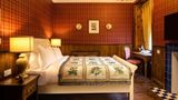 The Whispering Pine Lodge Room