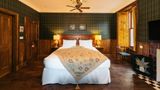 The Whispering Pine Lodge Room