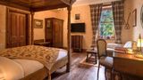 The Whispering Pine Lodge Room