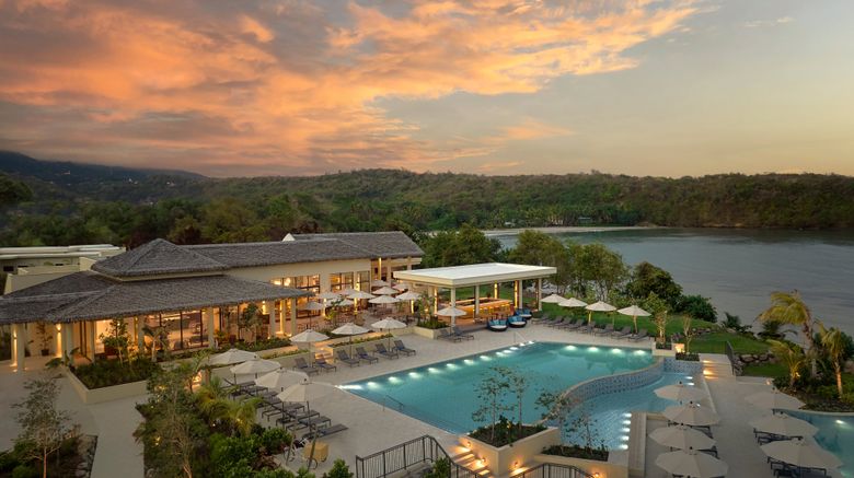 Six Senses La Sagesse Exterior. Images powered by <a href=https://www.travelweekly.com/Hotels/St-Davids-Grenada/