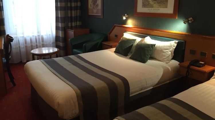 Hotel de la Paix Room
