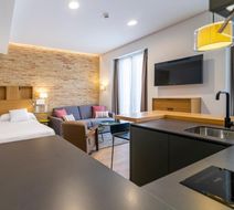 Aquitania Home Suites Room