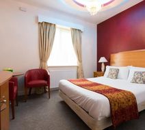 The Pearl Hotel Room