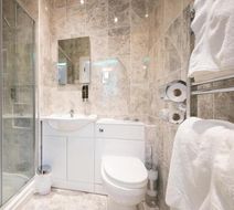 The Pearl Hotel Room