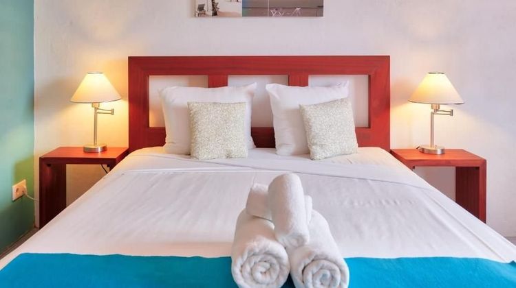 The Ritz Village Hotel Room