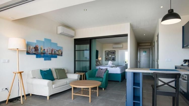 The Ritz Village Hotel Room