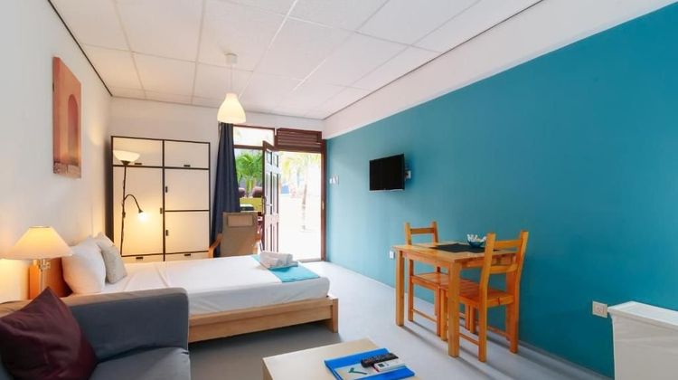 The Ritz Village Hotel Room