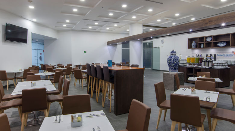 <b>Holiday Inn Express Puebla Restaurant</b>. Images powered by <a href="https://www.leonardoworldwide.com/" title="Leonardo Worldwide" target="_blank">Leonardo</a>.