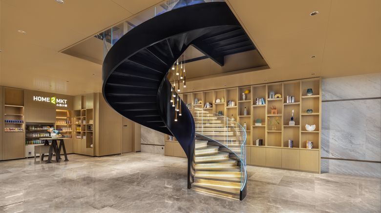<b>Home2 Suites by Hilton Xinjian Kuche Lobby</b>. Images powered by <a href="https://www.leonardoworldwide.com/" title="Leonardo Worldwide" target="_blank">Leonardo</a>.