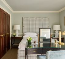 The Milestone Hotel and Residences Room