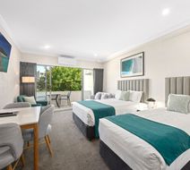 Palm Court Motor Inn Room