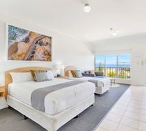 Coast Motel and Apartments Room