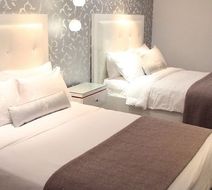 La Pensione Hotel Room