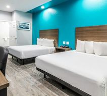 Scottish Inns & Suites Room