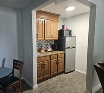 O'Cairns Inn & Suites Room