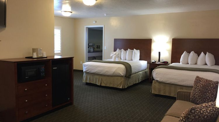 Dinosaur Inn & Suites Room